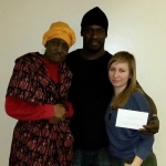 Ayejah, Liem and Kalin (family of Willie Harper) holding the check from the FU4J Xmas fundraiser.